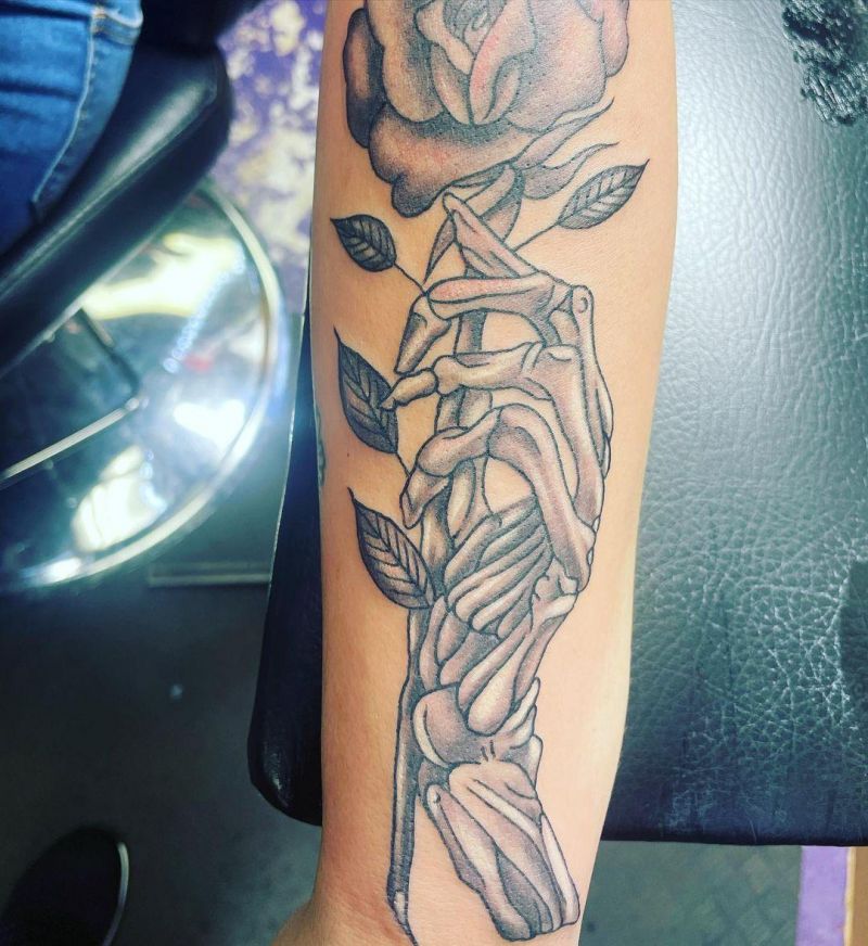 30 Unique Hand Holding Rose Tattoos You Must Love