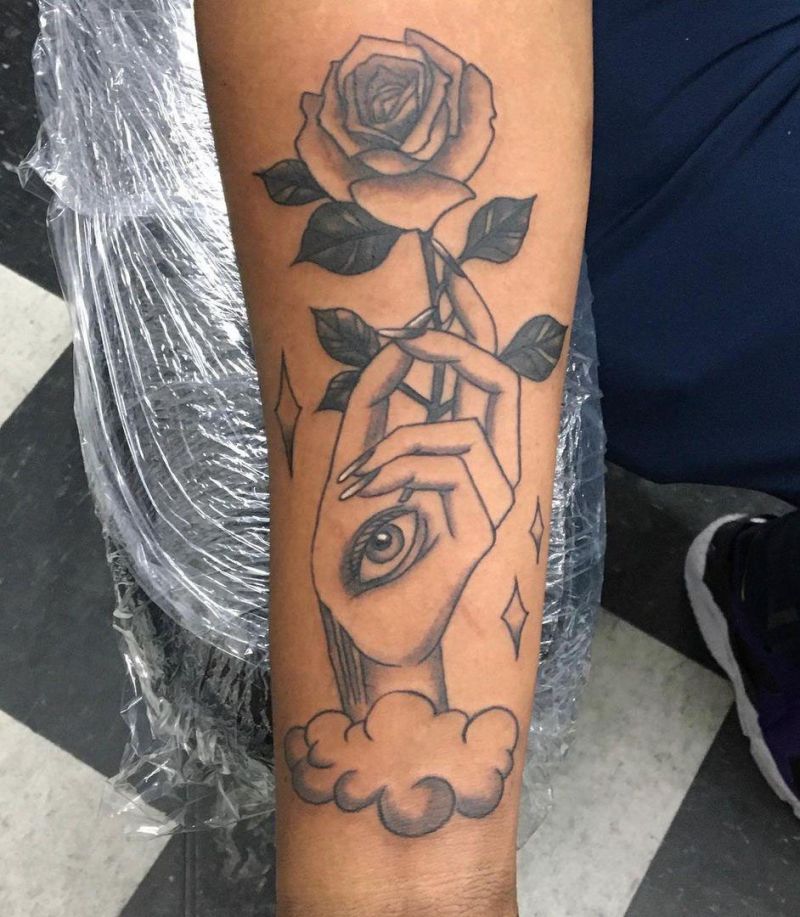 30 Unique Hand Holding Rose Tattoos You Must Love