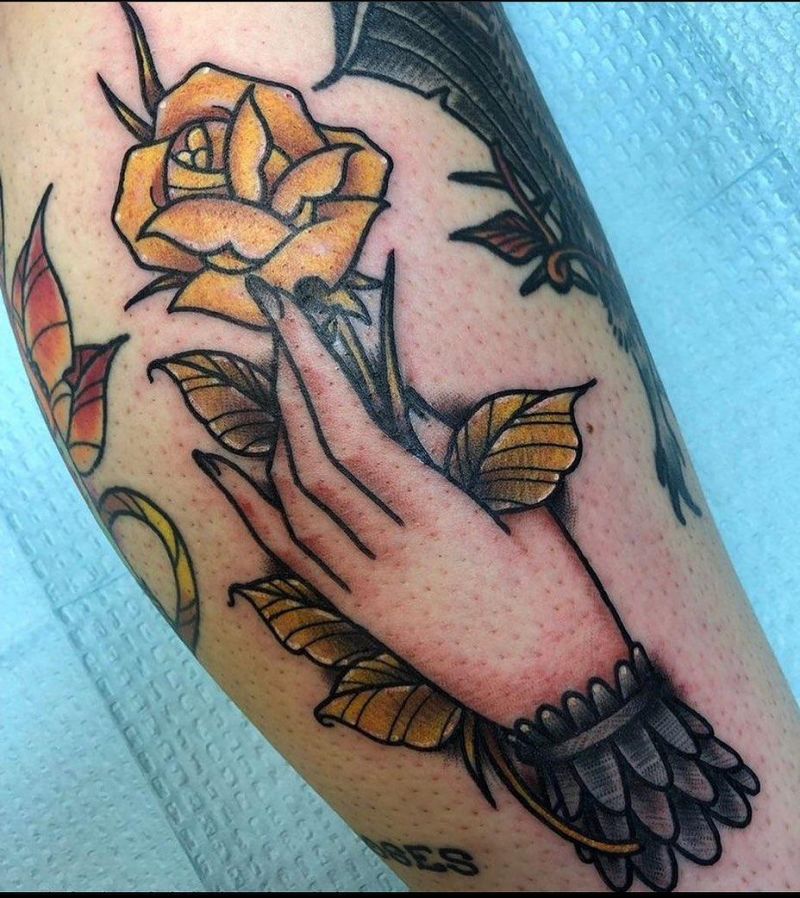 30 Unique Hand Holding Rose Tattoos You Must Love