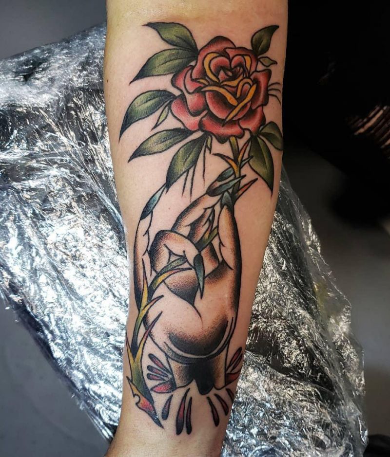 30 Unique Hand Holding Rose Tattoos You Must Love