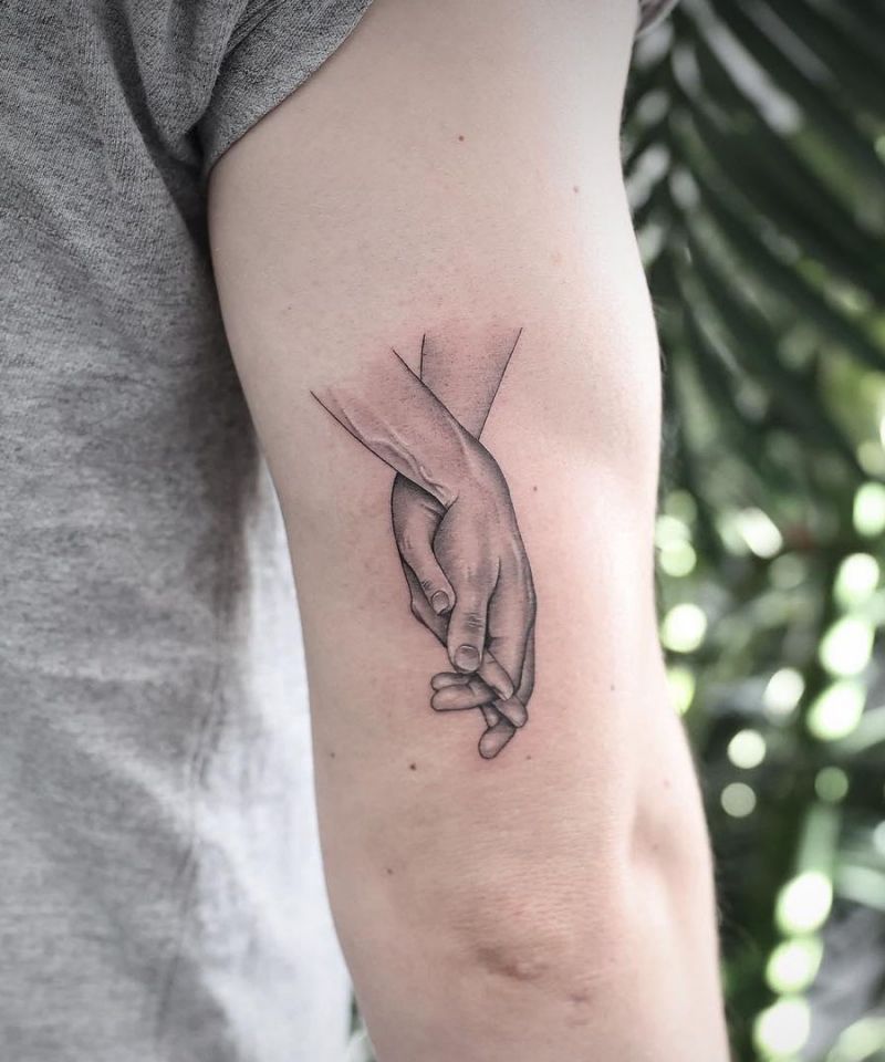 30 Great Holding Hands Tattoos You Will Love