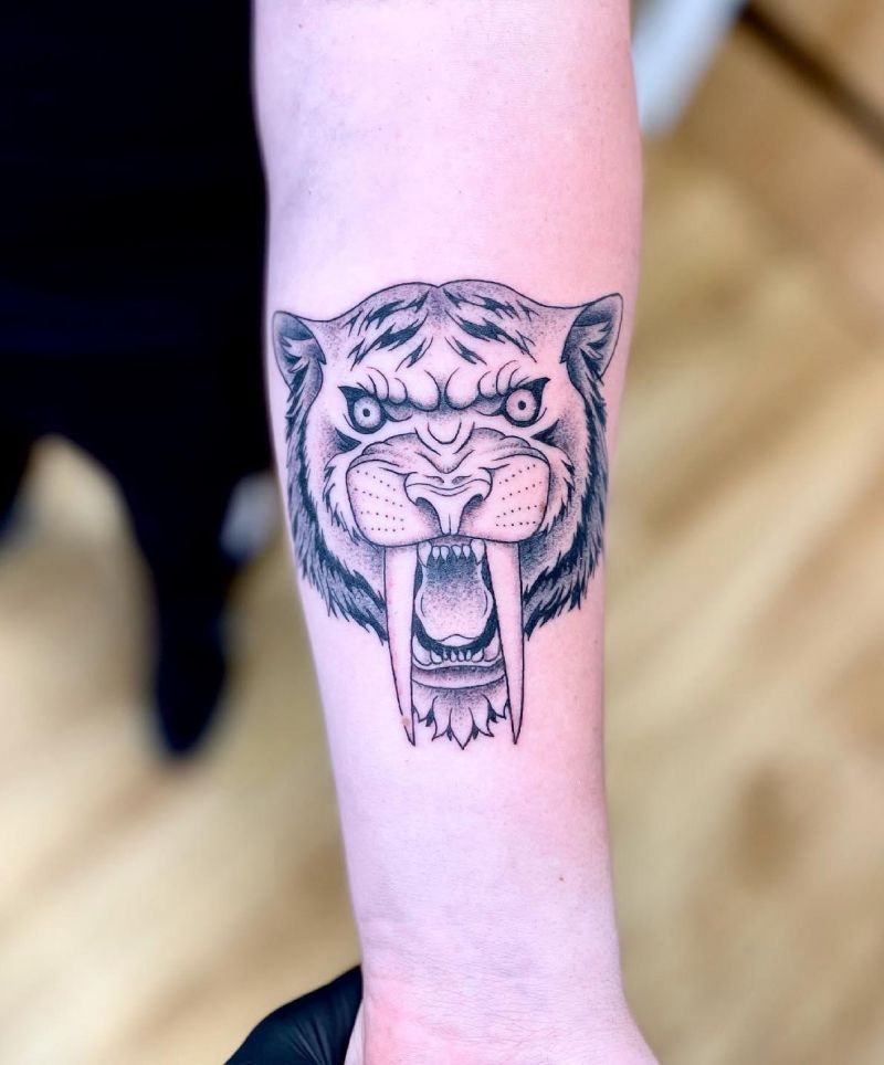 30 Unique Saber Tooth Tiger Tattoos Make You Attractive