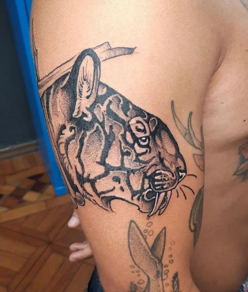 30 Unique Saber Tooth Tiger Tattoos Make You Attractive