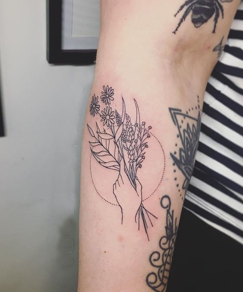 30 Great Hand Holding Flowers Tattoos Make You Attractive