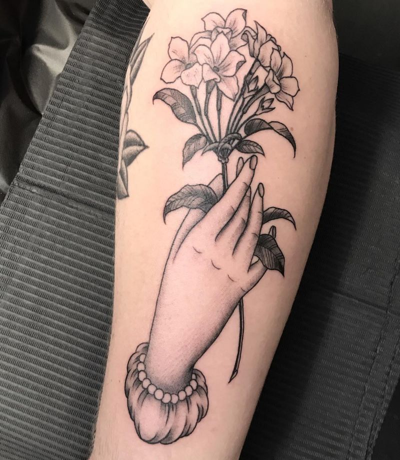 30 Great Hand Holding Flowers Tattoos Make You Attractive