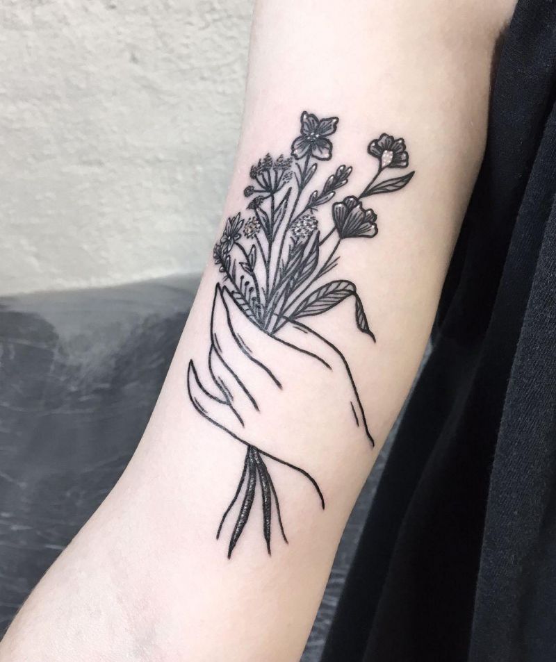 30 Great Hand Holding Flowers Tattoos Make You Attractive