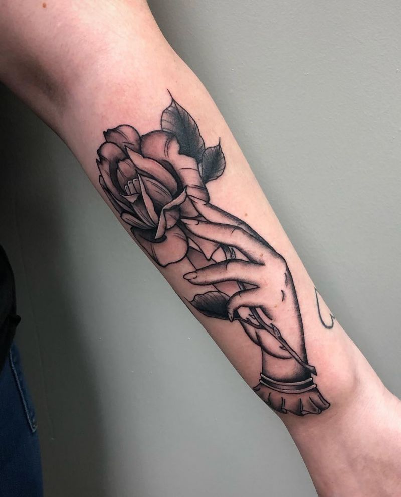 30 Great Hand Holding Flowers Tattoos Make You Attractive