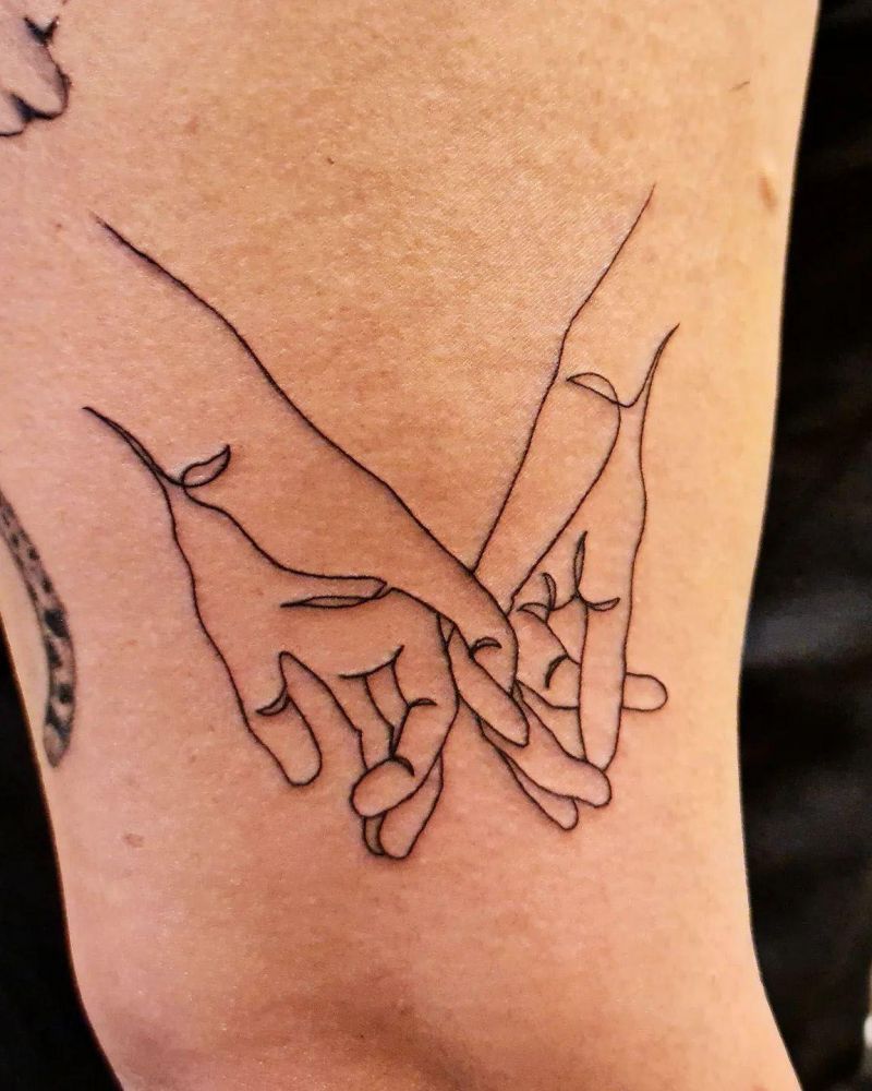 30 Great Holding Hands Tattoos You Will Love