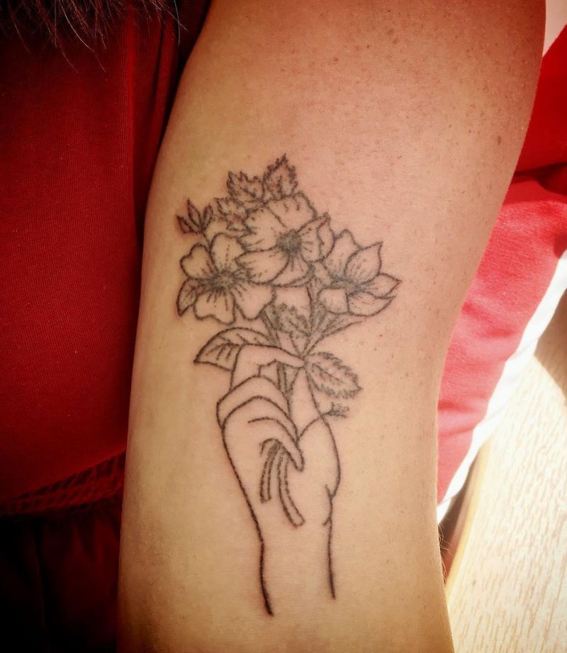 30 Great Hand Holding Flowers Tattoos Make You Attractive