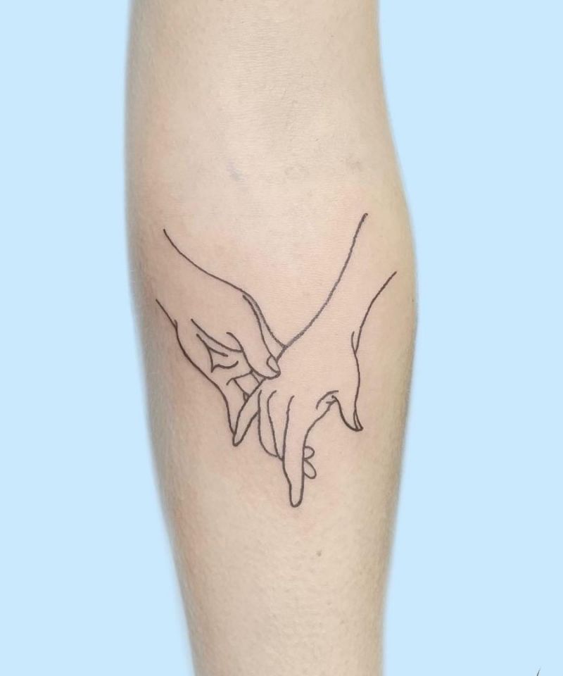 30 Great Holding Hands Tattoos You Will Love