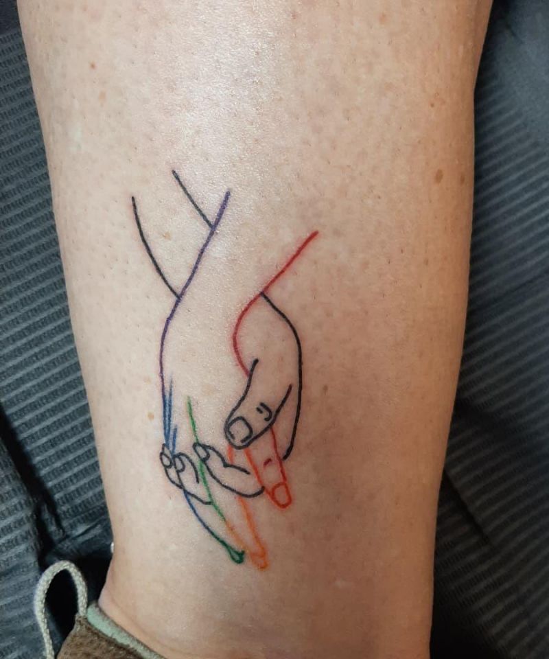 30 Great Holding Hands Tattoos You Will Love