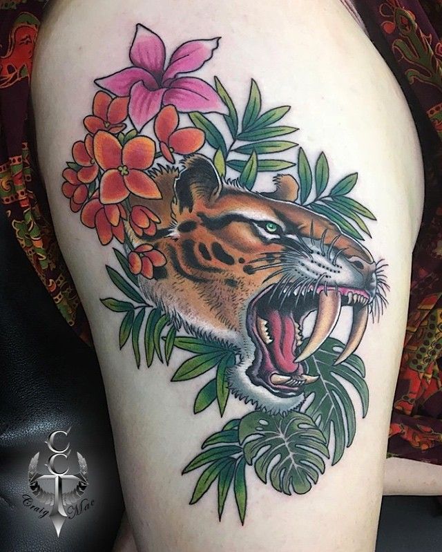 30 Unique Saber Tooth Tiger Tattoos Make You Attractive