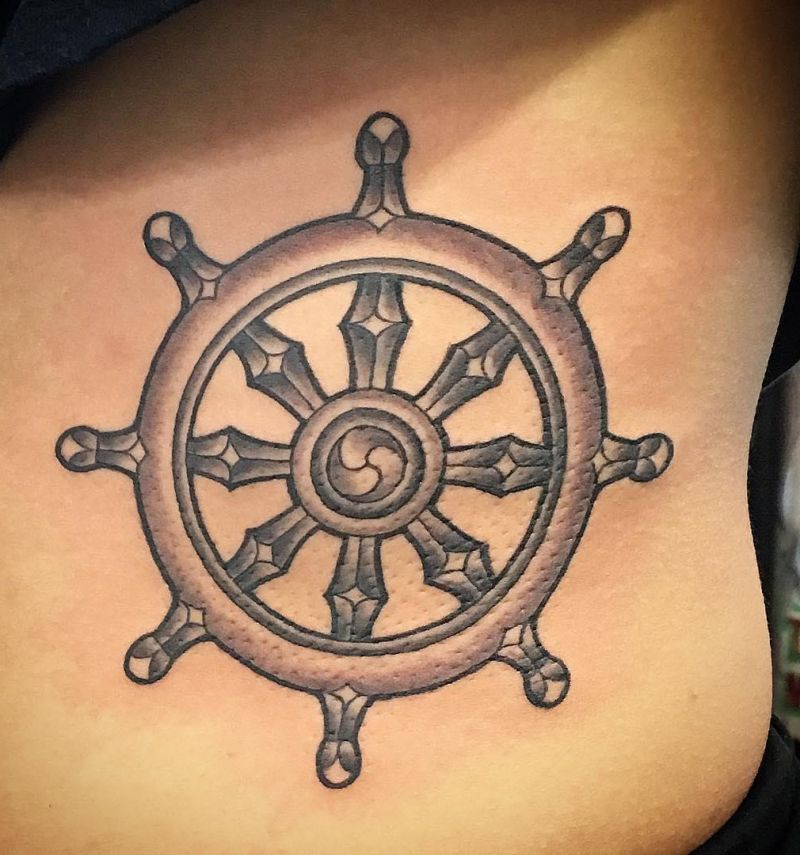 30 Awesome Dharma Wheel Tattoos to Inspire You