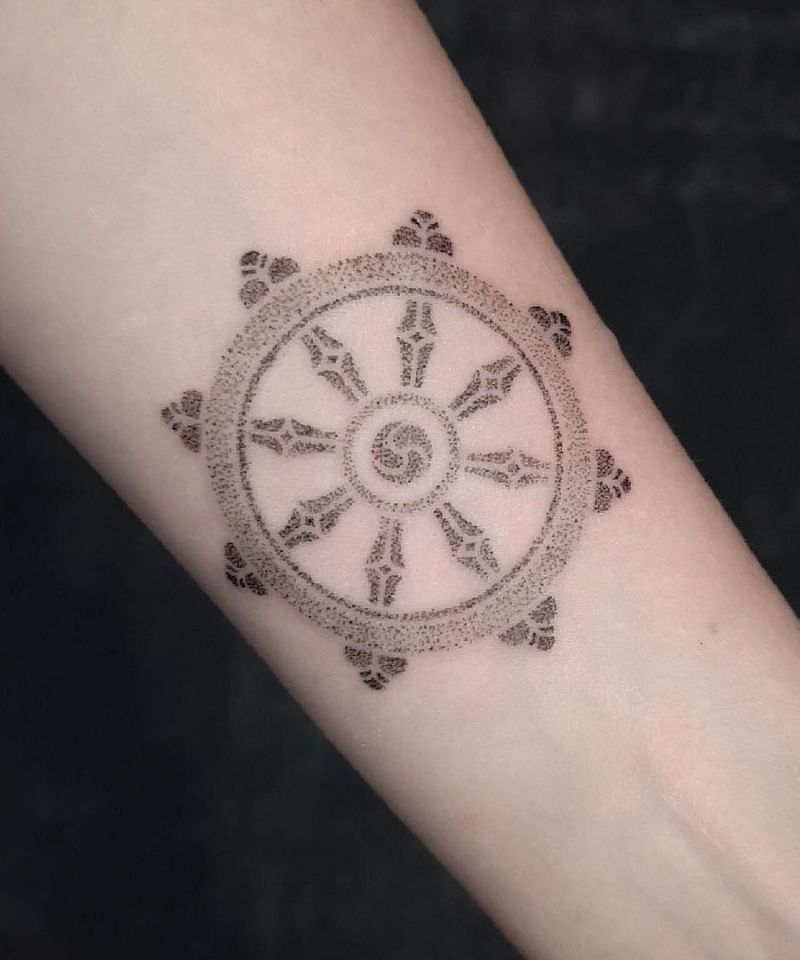 30 Awesome Dharma Wheel Tattoos to Inspire You