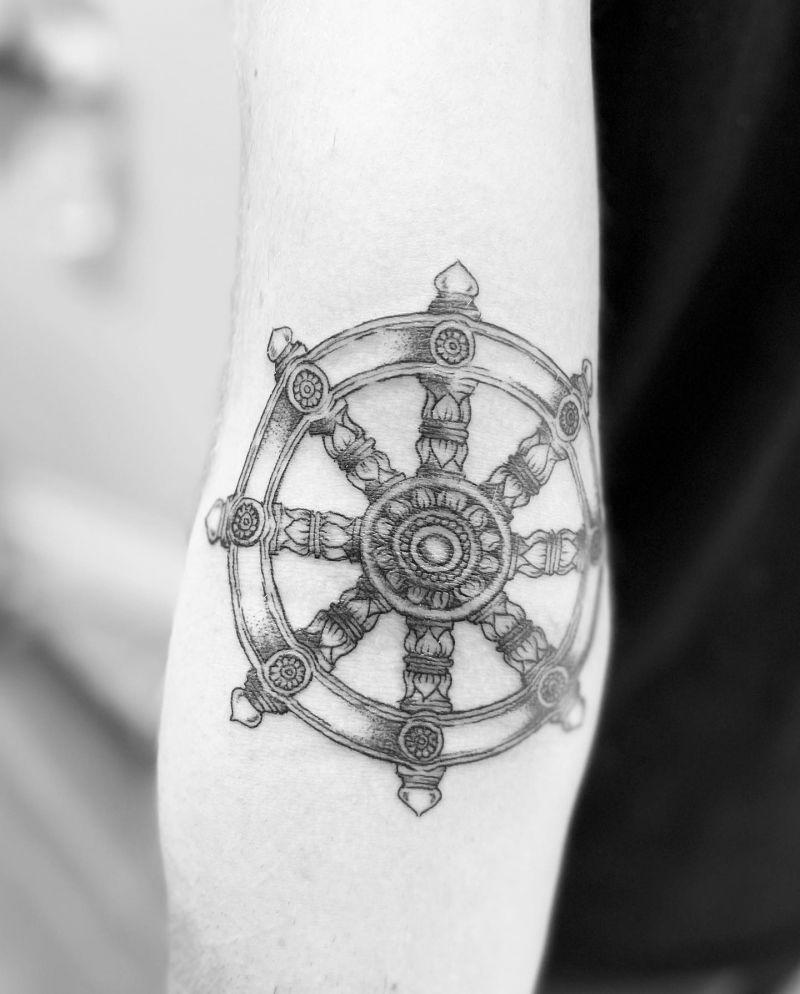 30 Awesome Dharma Wheel Tattoos to Inspire You