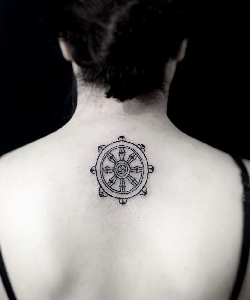 30 Awesome Dharma Wheel Tattoos to Inspire You