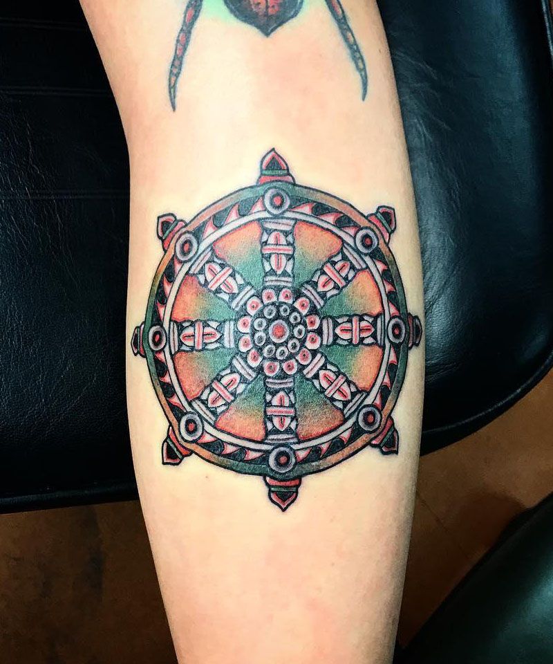 30 Awesome Dharma Wheel Tattoos to Inspire You