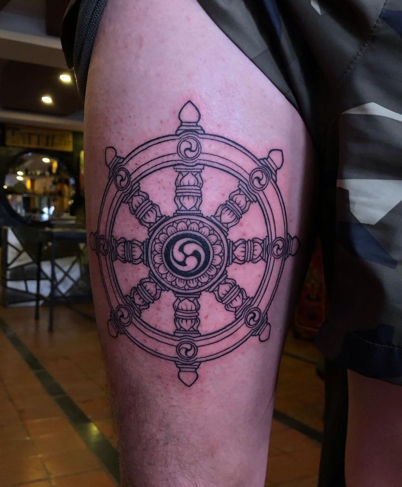 30 Awesome Dharma Wheel Tattoos to Inspire You