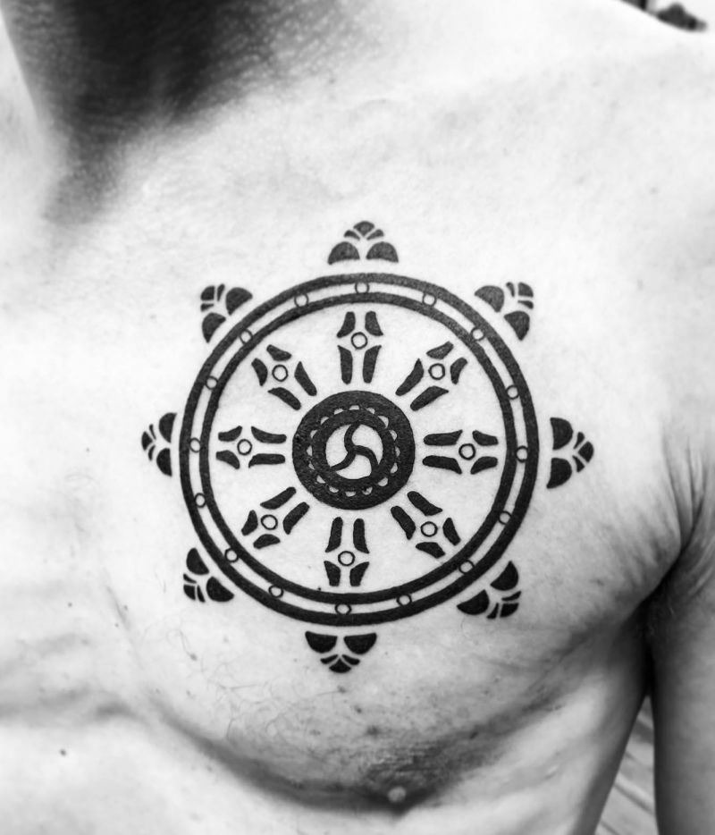 30 Awesome Dharma Wheel Tattoos to Inspire You