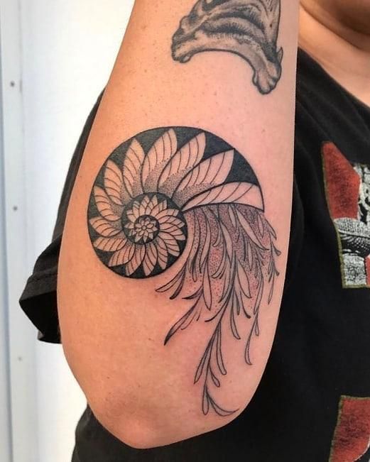 30 Awesome Nautilus Shell Tattoos You Can Copy