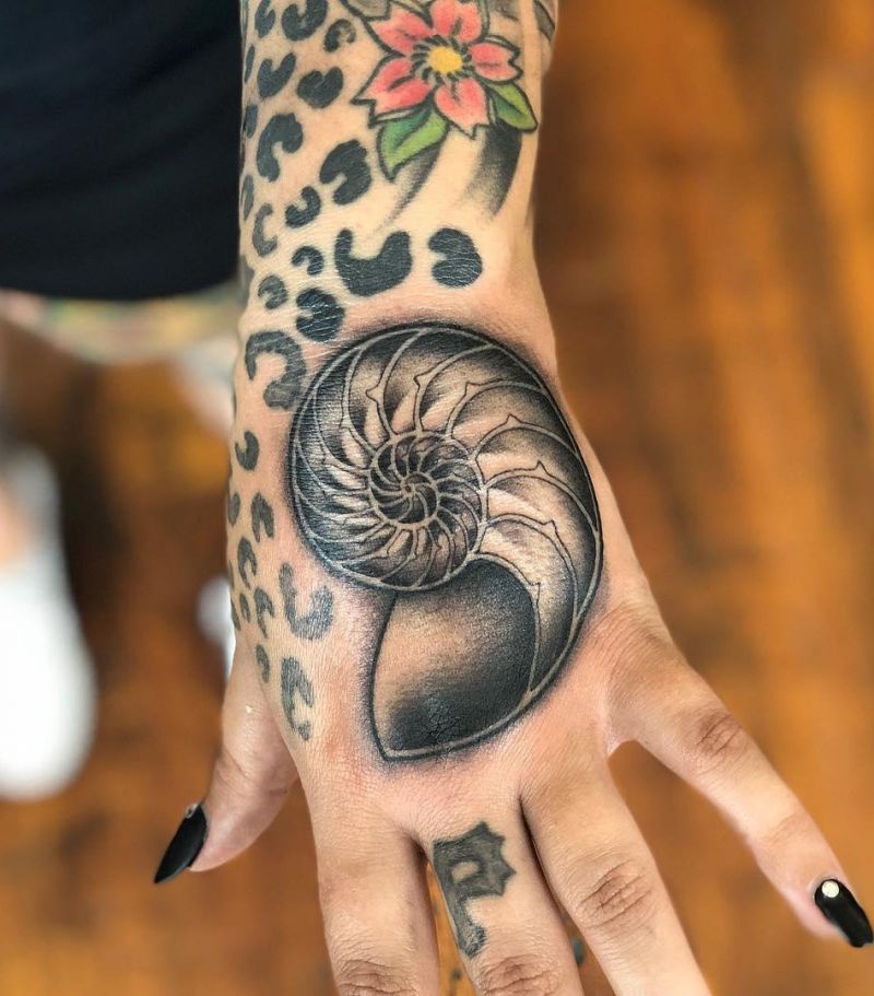 30 Awesome Nautilus Shell Tattoos You Can Copy