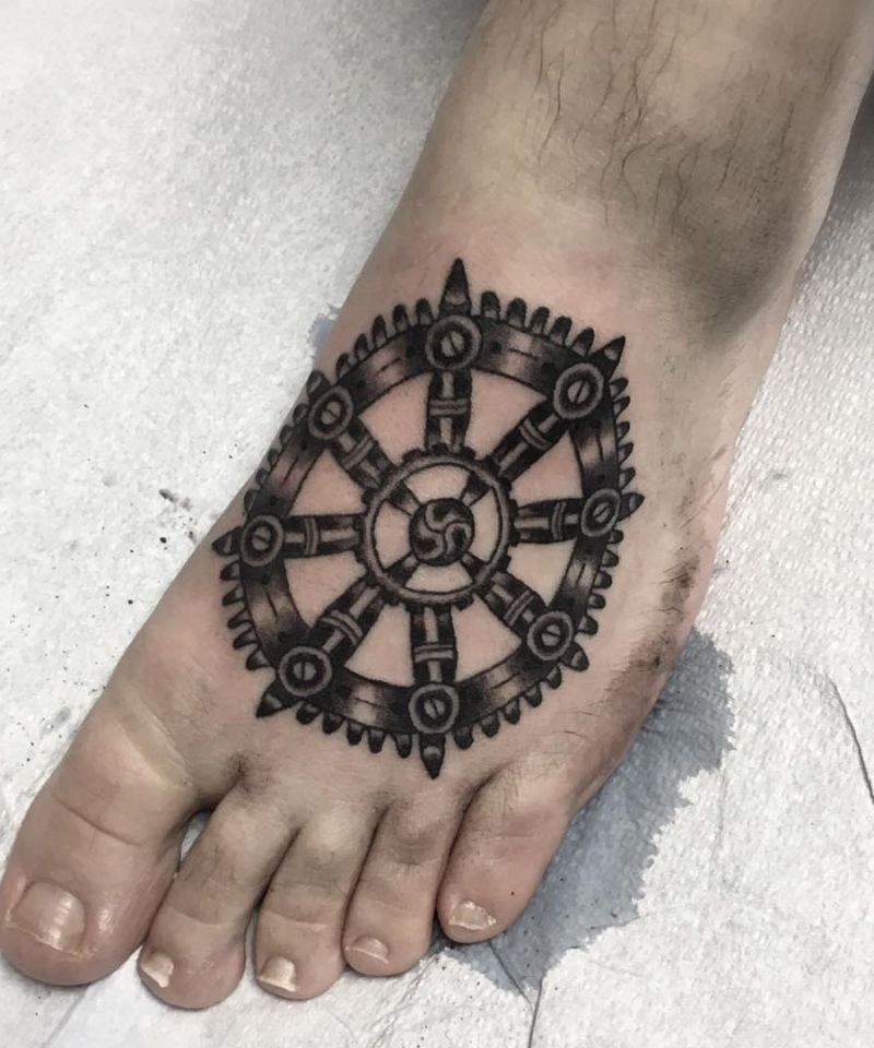 30 Awesome Dharma Wheel Tattoos to Inspire You