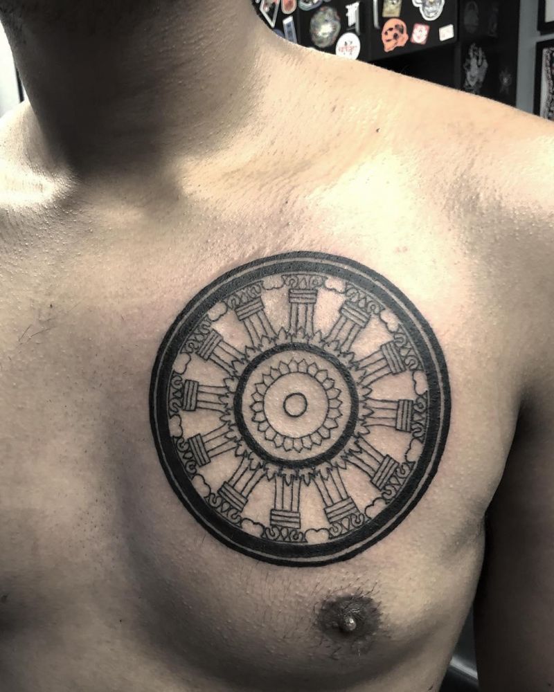 30 Awesome Dharma Wheel Tattoos to Inspire You