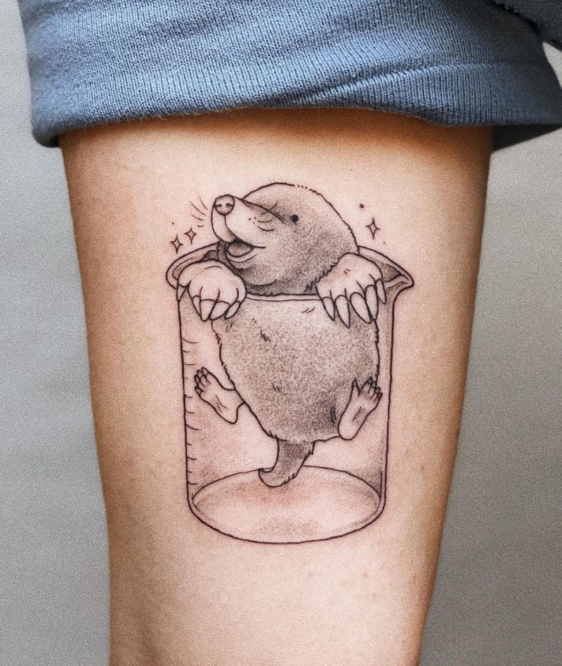 20 Classy Mole Tattoos You Can Copy