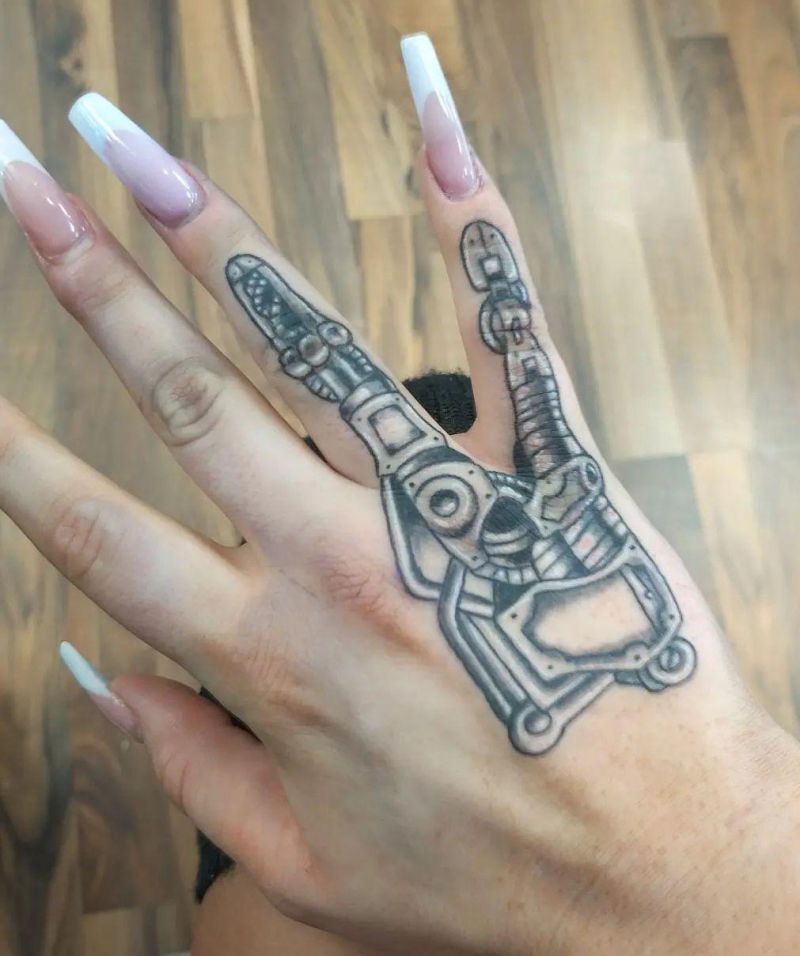 6 Unique Mechanical Hand Tattoos You Must Love