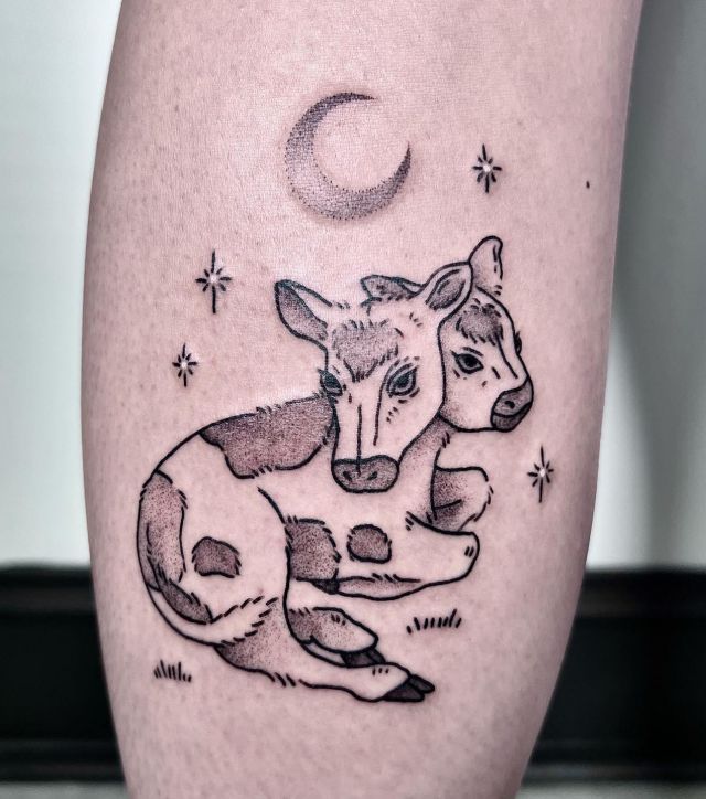 Two Headed Calf Tattoo On Lower Leg
