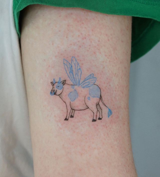 Fairy Cow Tattoo with Light Blue Wings