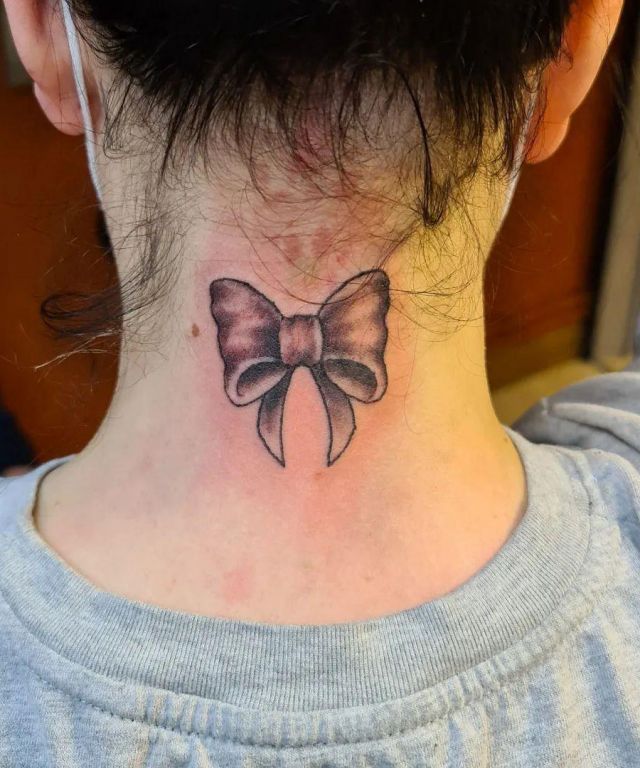 Bow Tie Tattoo on The Back of Neck