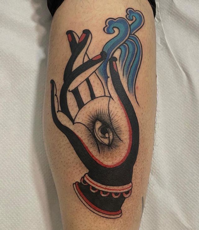 Vivid Mudra Tattoo on Leg