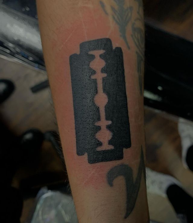 Simple Black Razor Blade Tattoo on Wrist