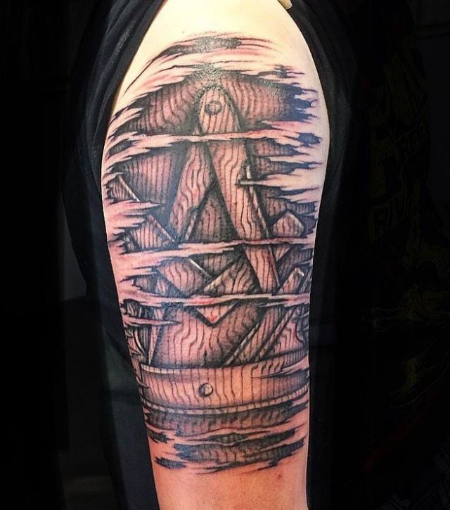 Tear Skin Wood Carving Tattoo