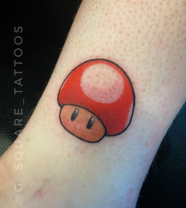 Cute Red Mario Mushroom Tattoo on Leg