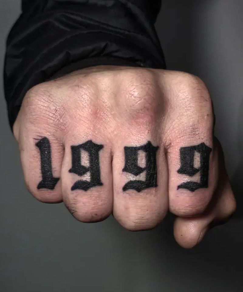 Number 1999 tattoo on Finger