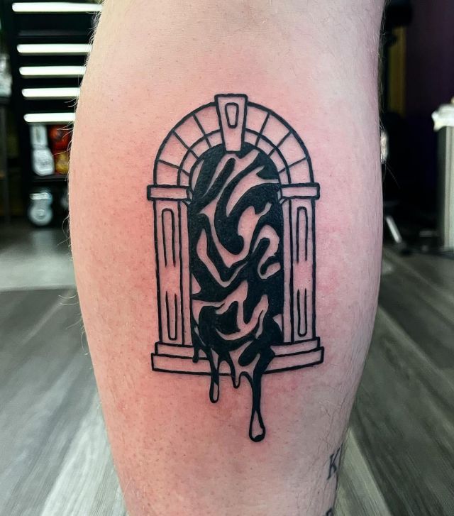 Unique Black Doorway Tattoo on Leg