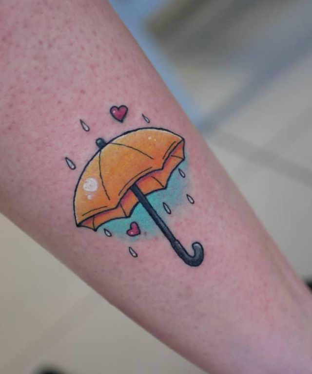 Yellow Umbrella In The rain Tattoo with Red Heart