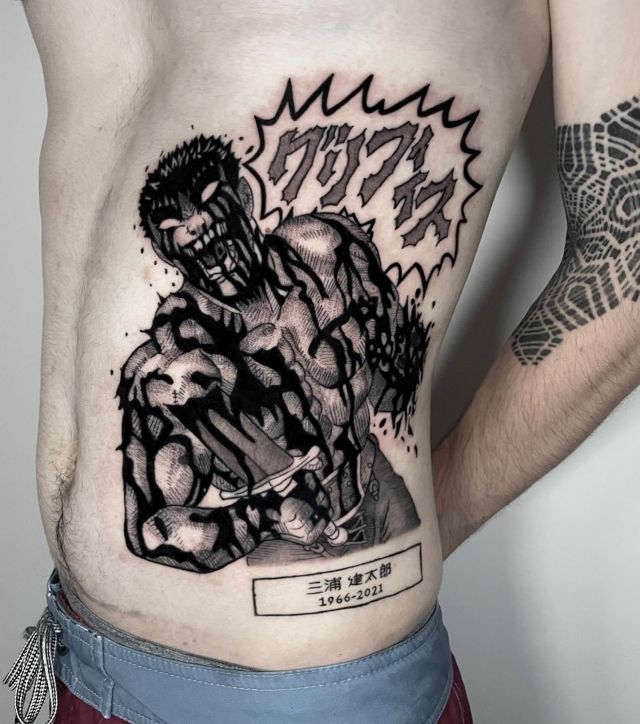 Black Berserk Tattoo on Stomach