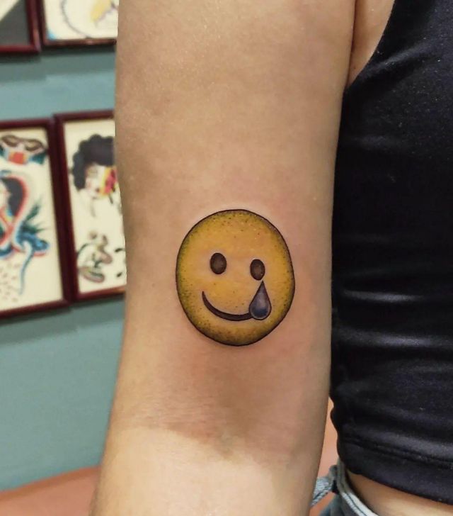 Sad Emoji Tattoo on Arm