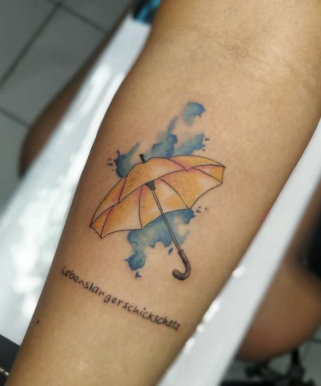 HIMYM Watercolor Yellow Umbrella Tattoo with letters