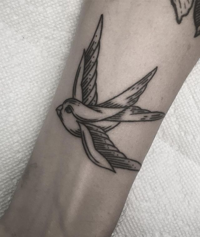 Swallow Wood Carving Tattoo