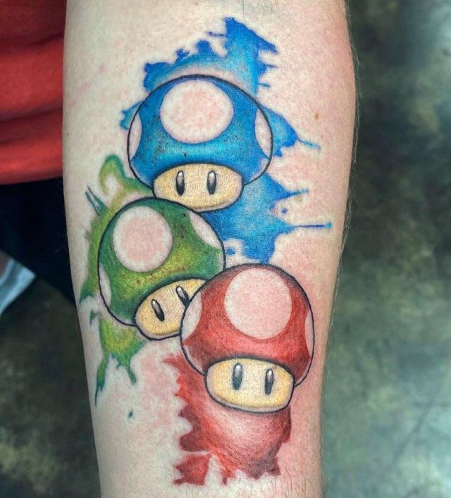 Three Watercolor Mario Mushroom Tattoo on Arm