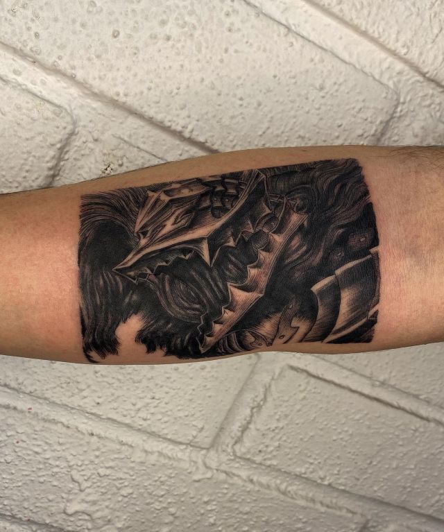 Black Berserk Tattoo on Arm