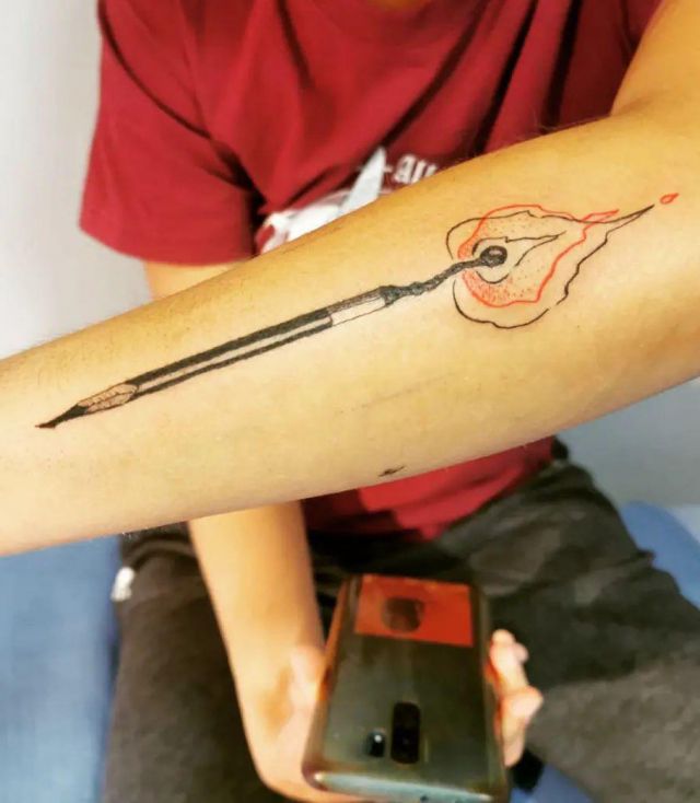 Pencil Tattoo With Fire on Arm