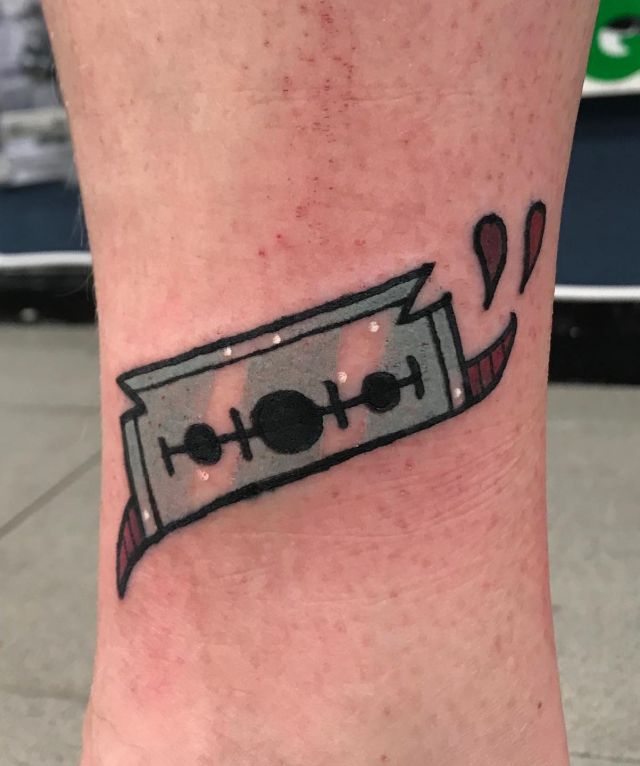 Cool Razor Blade Tattoo on Leg