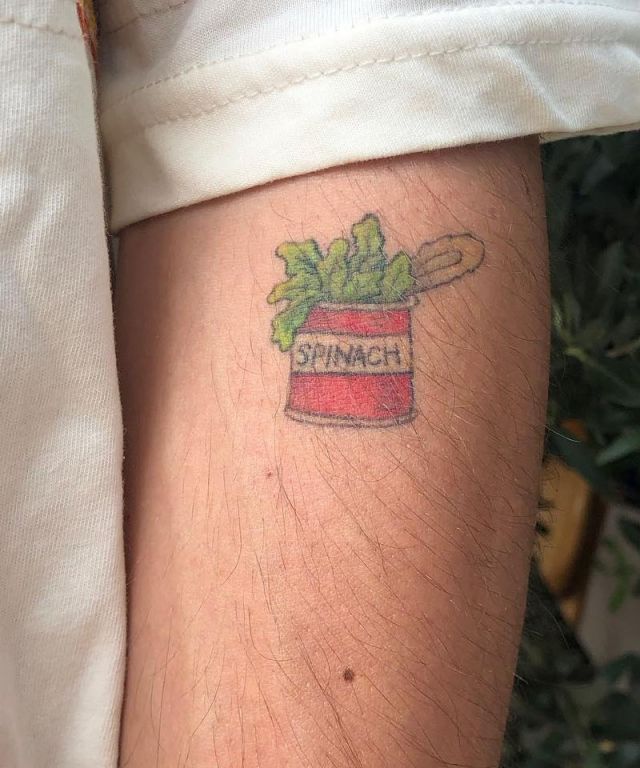 Red Popeye Spinach Tattoo on Arm