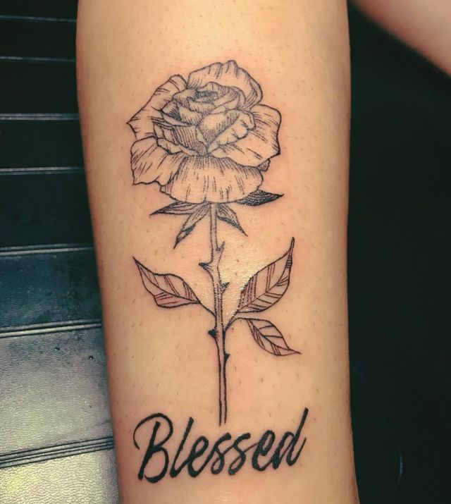 Elegant Blessed Rose Tattoo on Upper Arm