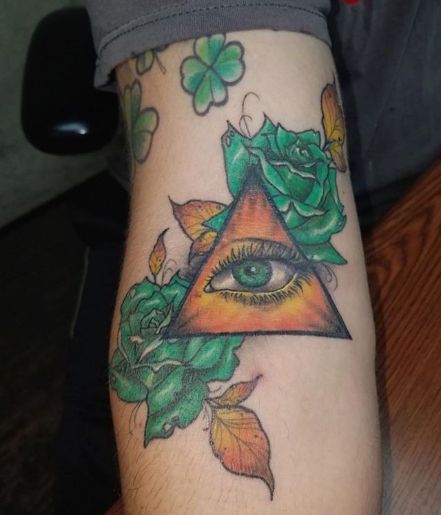 Green Rose Tattoo with All-seeing Eye on Arm